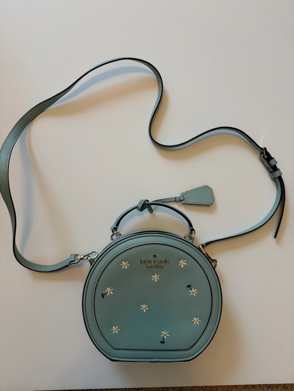 kate spade round crossbody with flower accents - canteen bag